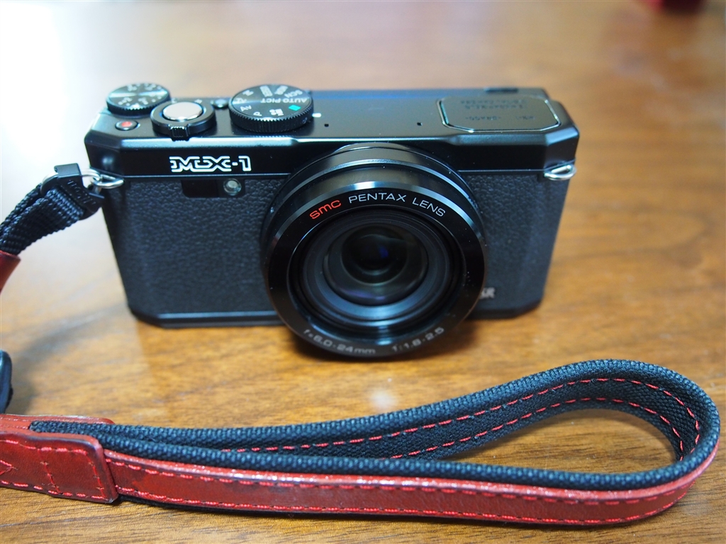 価格.com - 『ニコン三角環経由のハンドストラップ』ペンタックス