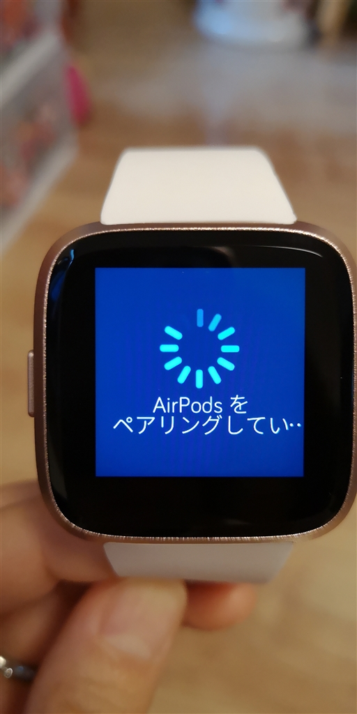 fitbit versa airpods