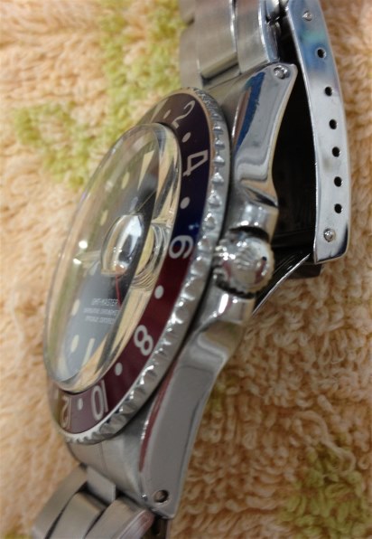 ロレックス 116528 デイトナ 自動巻き（ブラックxシャンパン） 価格